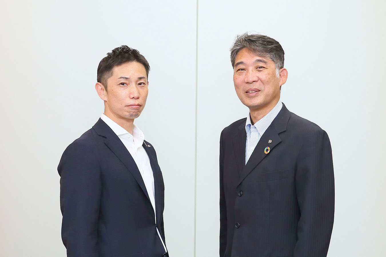 写真左から、セブン-イレブン・ジャパンの 小野寺 隆 氏、長澤 秀華 氏 - Google Cloud 導入事例